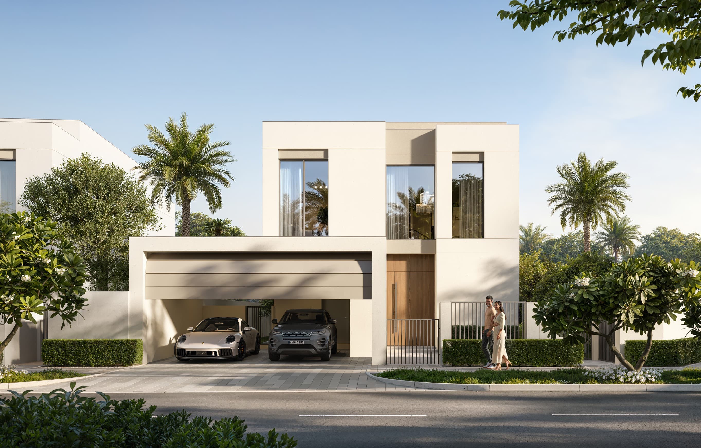 Serro villa exterior with white minimalist facade, luxury sports cars in the garage, and palm tree landscaping at The Heights Dubai South